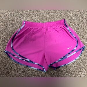 Nike Dri-FIT Large running shorts in pink with a blue and gray camo print trim